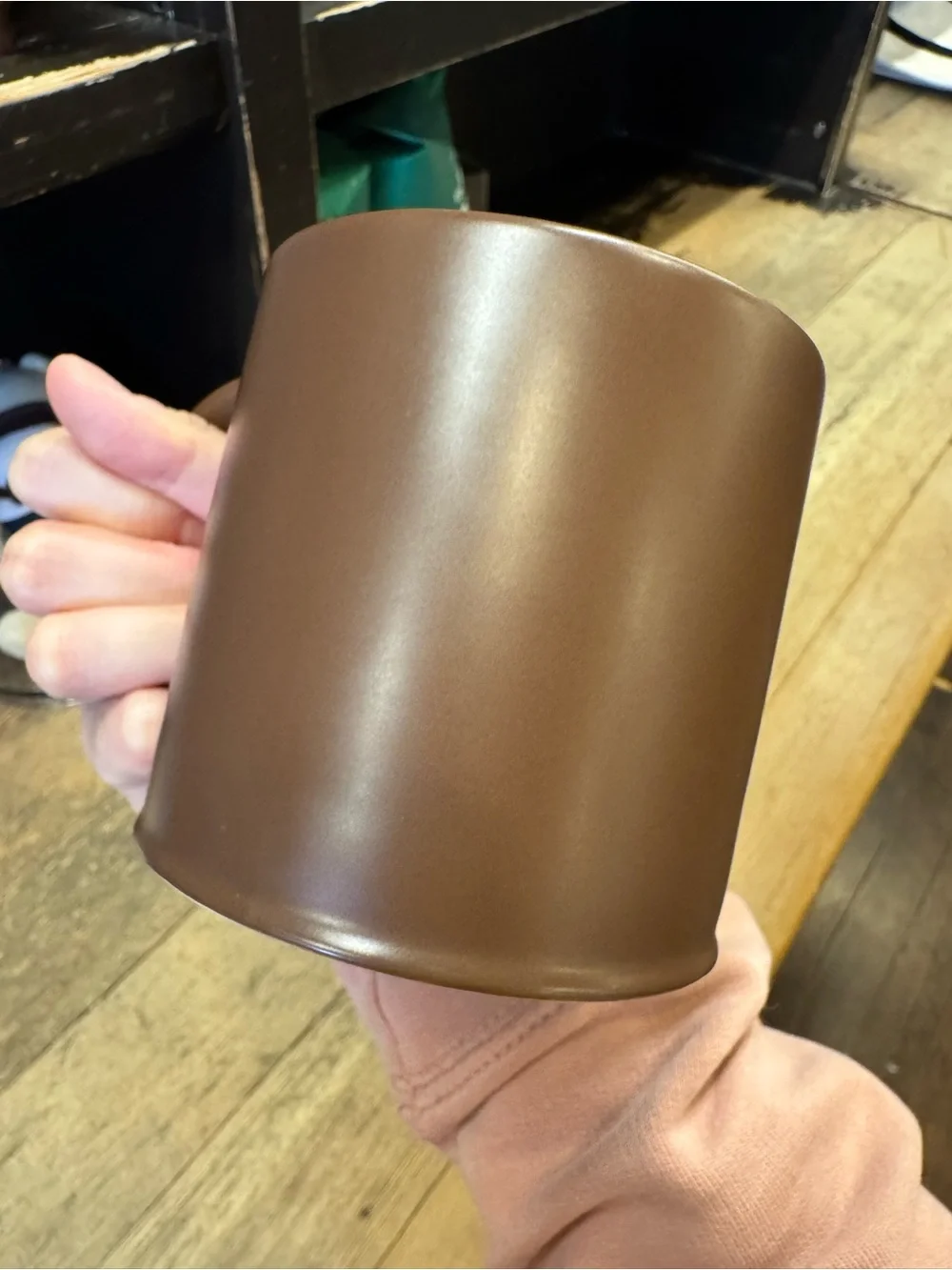 First Starbucks Brown Ceramic Mug with White Storefront Design